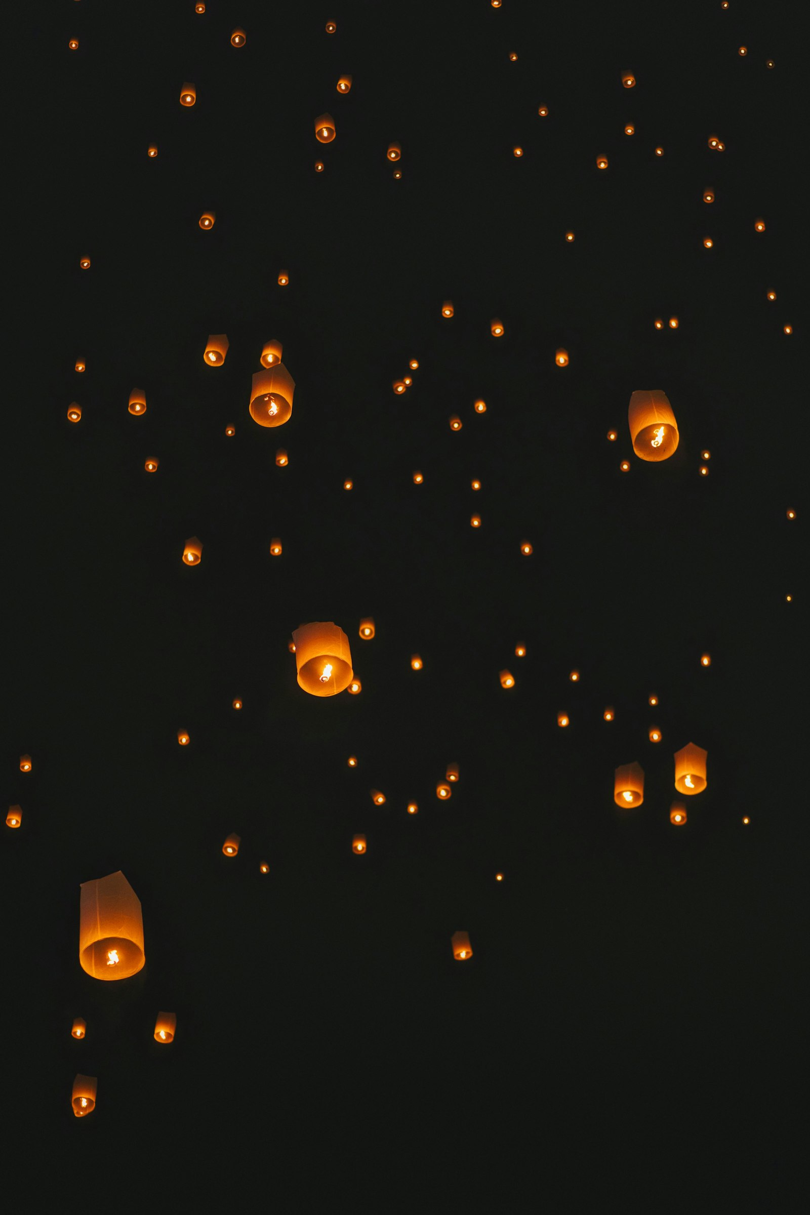 Glowing sky lanterns released during Chiang Mai's Yi Peng festival